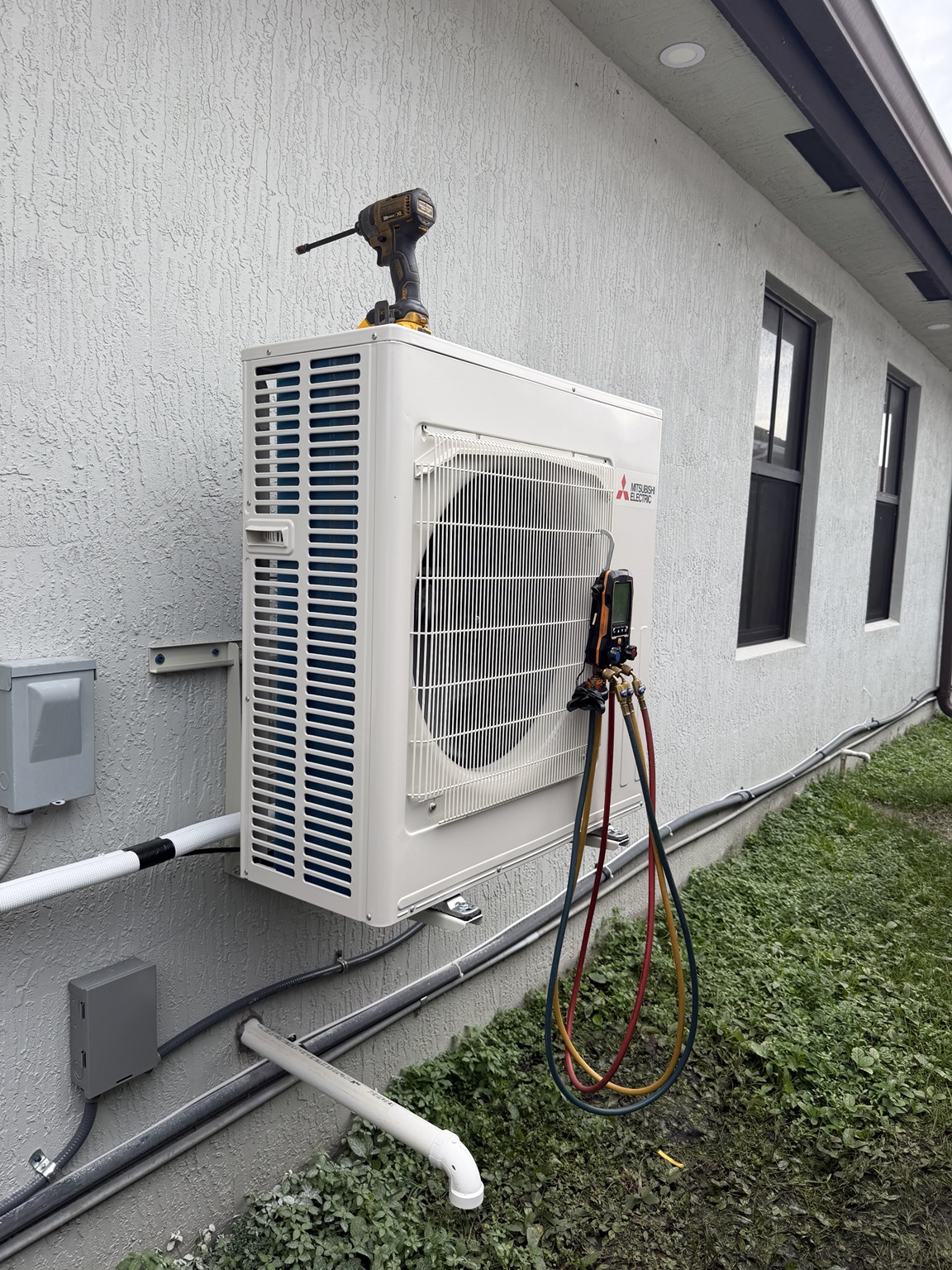 Wall-mounted mini-split installation